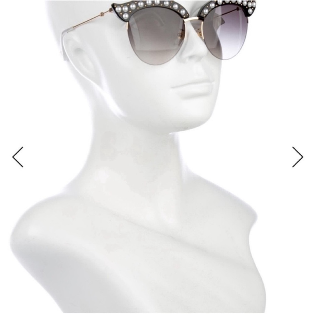 NWT and case
Gucci Black Sunglasses with Pearl Accents

Org 680 never worn